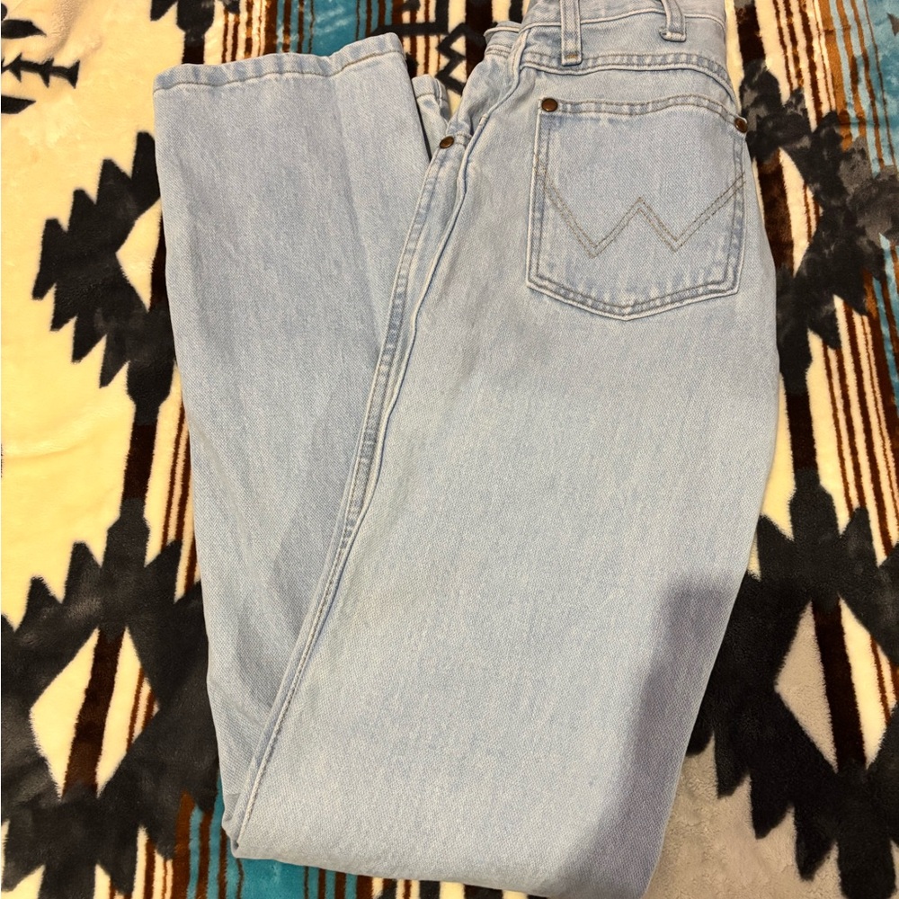 Wrangler cowboy cut 
Never worn 
Size 1/34